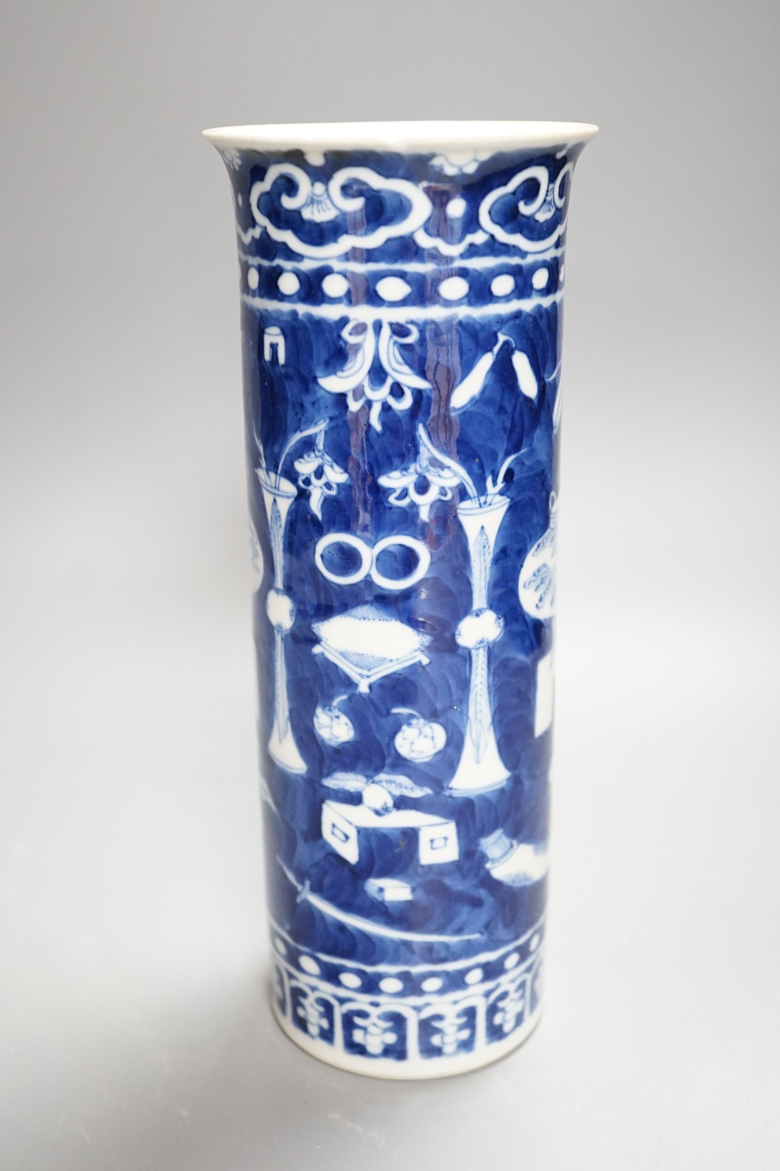 A Chinese blue and white sleeve vase and small famille rose vase, sleeve vase 25 cms high.